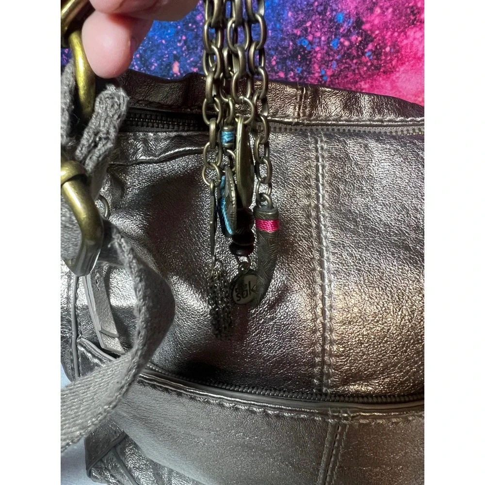 The Sak Metallic Pewter Leather Crossbody Bag Boho Charm Antiqued Brass Hardware